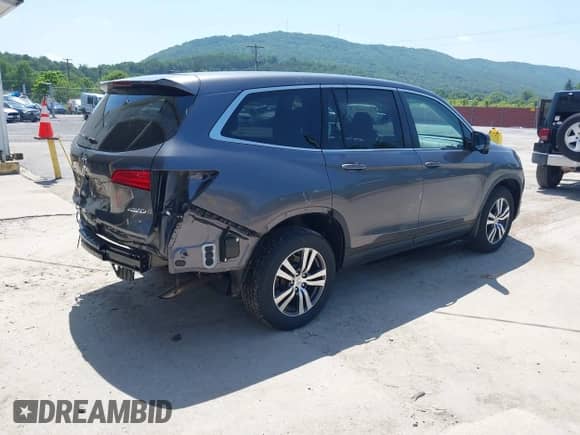 2018 Honda Pilot EX-L z VIN 5FNYF6H68JB037653, wystawiony jako IAAI lot #42556559 z przebiegiem 40 028 mil mil oraz . Historia ofert i sprzedaży dostępna na DreamBid. Obrazek 4.