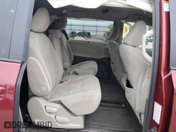 2015 Toyota Sienna LE z VIN 5TDKK3DC9FS585109, wystawiony jako Copart lot #81757415 z przebiegiem 138 851 mil mil oraz Nie do naprawy • Non repairable. Historia ofert i sprzedaży dostępna na DreamBid. Obrazek 11.