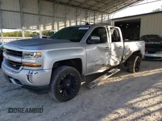 2016 Chevrolet Silverado 1500 LT with VIN 1GCVKREC6GZ134105, listed as a Copart auction lot 84449095 with 121,178 mi miles and Salvage title. Bid and sale history available at DreamBid. Image 1.