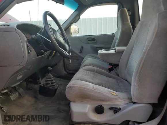 2001 Ford F-150 XL с VIN 2FTPF18L61CA10592, выставлен на аукционе Copart как лот 80174165 с пробегом Не указан миль и Списание • Salvage title. История ставок и продаж доступна на DreamBid. Изображение 7.