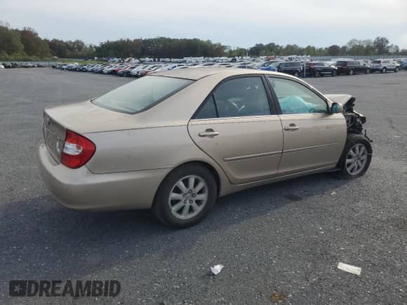 2002 Toyota Camry XLE with VIN 4T1BF30KX2U023206, listed as a Copart auction lot 84586185 with Not provided miles and Salvage title. Bid and sale history available at DreamBid. Image 3.