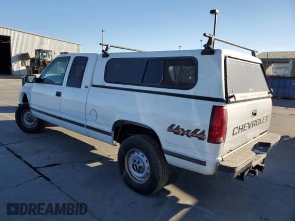 1995 Chevrolet Silverado 2500 с VIN 2GCFK29K1S1280801, выставлен на аукционе Copart как лот 74018874 с пробегом 75 827 миль миль и Списание • Salvage title. История ставок и продаж доступна на DreamBid. Изображение 2.