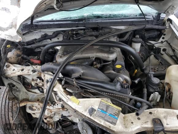 2002 Chevrolet Tracker ZR2 с VIN 2CNBJ734726925605, выставлен на аукционе Copart как лот 60070915 с пробегом Не указан миль и Списание • Salvage title. История ставок и продаж доступна на DreamBid. Изображение 11.
