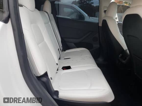 2024 Tesla Model Y Long Range с VIN 7SAYGAEE4RF205752, выставлен на аукционе Copart как лот 90033845 с пробегом Не указан миль и Чистый • Clean title. История ставок и продаж доступна на DreamBid. Изображение 10.