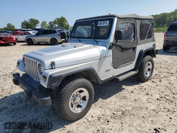 2002 Jeep Wrangler X with VIN 1J4FA39S02P750998, listed as a Copart auction lot 66619075 with 98,985 mi miles and Clean title. Bid and sale history available at DreamBid. Image 1.