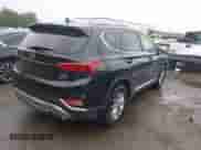2019 Hyundai Santa Fe SEL with VIN 5NMS3CAD7KH131884, listed as a IAAI auction lot 43025635 with 70,150 mi miles and . Bid and sale history available at DreamBid. Image 4.