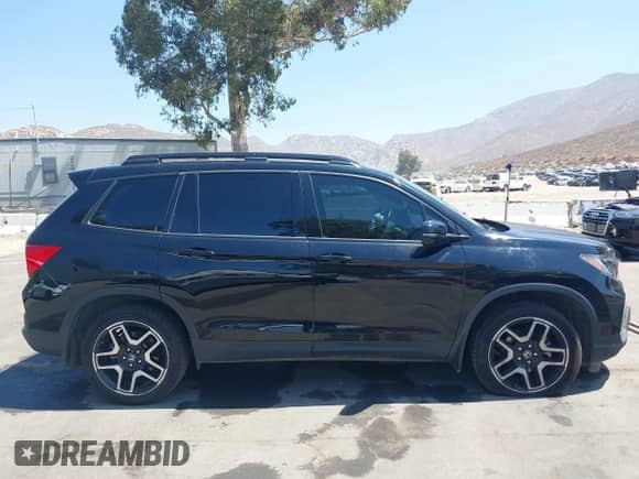 2023 Honda Passport Elite z VIN 5FNYF8H07PB015868, wystawiony jako IAAI lot #42673230 z przebiegiem 82 096 mil mil oraz . Historia ofert i sprzedaży dostępna na DreamBid. Obrazek 13.
