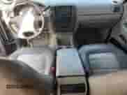 2004 Ford Explorer Eddie Bauer with VIN 1FMZU74W44UB78040, listed as a Copart auction lot 84029215 with 197,729 mi miles and Salvage title. Bid and sale history available at DreamBid. Image 8.