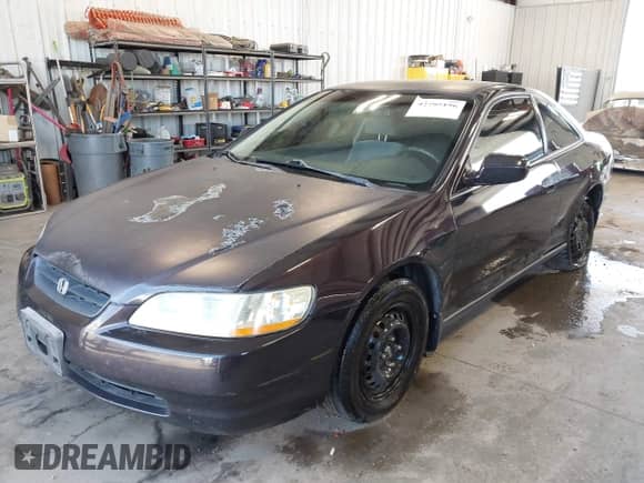 1999 Honda Accord LX z VIN 1HGCG3246XA015585, wystawiony jako IAAI lot #42795196 z przebiegiem 236 227 mil mil oraz . Historia ofert i sprzedaży dostępna na DreamBid. Obrazek 2.