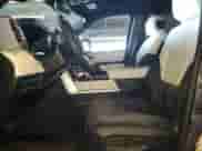 2024 Toyota Tundra Capstone Hybrid with VIN 5TFVC5DB9RX056156, listed as a Copart auction lot 82223795 with 21,135 mi miles and Salvage title. Bid and sale history available at DreamBid. Image 7.