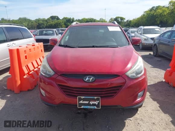 2015 Hyundai Tucson SE with VIN KM8JU3AGXFU049497, listed as a IAAI auction lot 43103818 with 125,628 mi miles and . Bid and sale history available at DreamBid. Image 12.