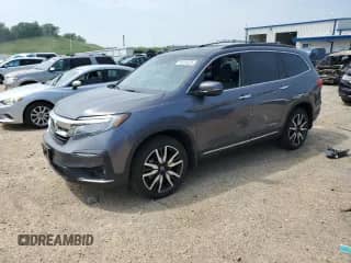 2021 Honda Pilot Elite z VIN 5FNYF6H05MB061568, wystawiony jako Copart lot #59226525 z przebiegiem 67 981 mil mil oraz Szkoda całkowita • Salvage title. Historia ofert i sprzedaży dostępna na DreamBid. Obrazek 1.