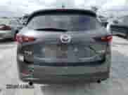 2023 Mazda CX-5 S Preferred z VIN JM3KFBCM8P0134709, wystawiony jako Copart lot #70990715 z przebiegiem 22 913 mil mil oraz Szkoda całkowita • Salvage title. Historia ofert i sprzedaży dostępna na DreamBid. Obrazek 6.