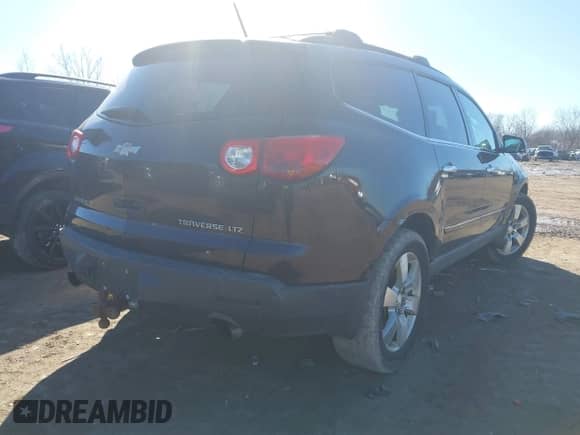 2009 Chevrolet Traverse LTZ z VIN 1GNER33D19S150882, wystawiony jako IAAI lot #41803912 z przebiegiem 156 229 mil mil oraz . Historia ofert i sprzedaży dostępna na DreamBid. Obrazek 4.