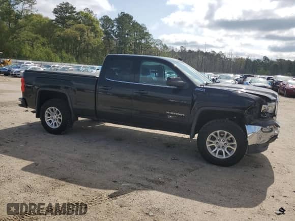 2018 GMC Sierra 1500 SLE с VIN 1GTV2MEC2JZ365755, выставлен на аукционе Copart как лот 51484355 с пробегом 62 570 миль миль и Списание • Salvage title. История ставок и продаж доступна на DreamBid. Изображение 4.