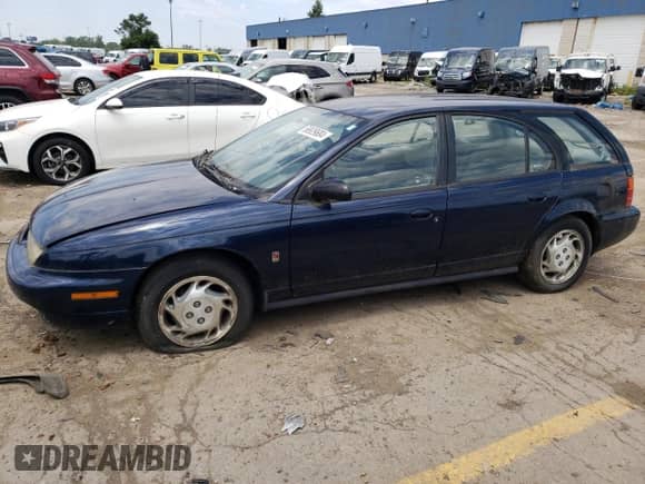 1997 Saturn SW with VIN 1G8ZK8279VZ361444, listed as a Copart auction lot 58929684 with 128,554 mi miles and Clean title. Bid and sale history available at DreamBid. Image 1.