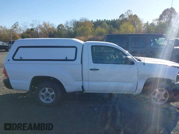 2012 Toyota Tacoma z VIN 5TFNX4CN7CX015297, wystawiony jako IAAI lot #43308388 z przebiegiem 276 426 mil mil oraz . Historia ofert i sprzedaży dostępna na DreamBid. Obrazek 13.