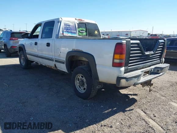 2002 Chevrolet Silverado 2500HD LS z VIN 1GCHK23162F190237, wystawiony jako IAAI lot #43517867 z przebiegiem 272 831 mil mil oraz . Historia ofert i sprzedaży dostępna na DreamBid. Obrazek 3.