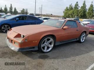 1991 Chevrolet Camaro RS с VIN 1G1FP23E4ML138405, выставлен на аукционе Copart как лот 83229674 с пробегом 158 348 миль миль и Списание • Salvage title. История ставок и продаж доступна на DreamBid. Изображение 1.