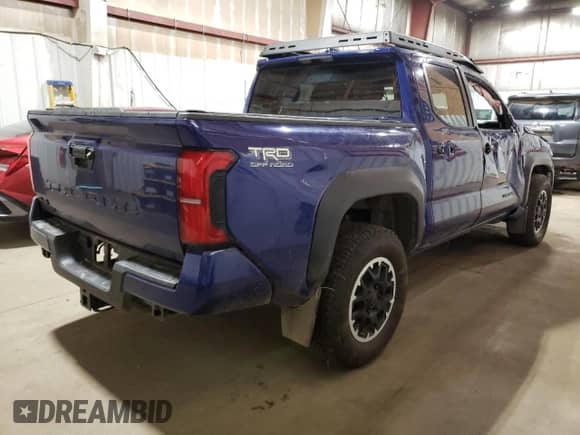 2024 Toyota Tacoma SR5 with VIN 3TMLB5JN1RM002946, listed as a Copart auction lot 68039525 with 21,113 mi miles and Salvage title. Bid and sale history available at DreamBid. Image 3.