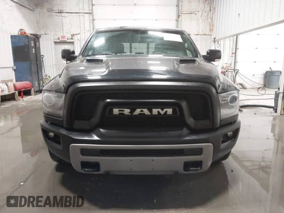 2016 Ram 1500 Rebel z VIN 1C6RR7YT2GS216684, wystawiony jako IAAI lot #41892815 z przebiegiem 79 648 mil mil oraz . Historia ofert i sprzedaży dostępna na DreamBid. Obrazek 12.