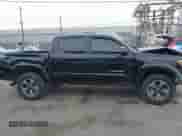 2017 Toyota Tacoma SR5 with VIN 3TMAZ5CN3HM026387, listed as a IAAI auction lot 42362780 with 216,739 mi miles and . Bid and sale history available at DreamBid. Image 13.