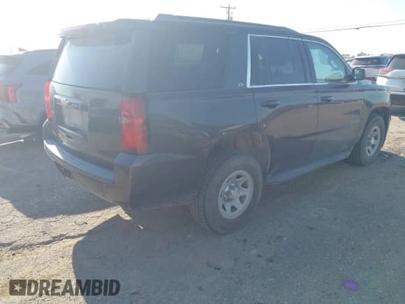 2016 Chevrolet Tahoe LS with VIN 1GNSKAKC9GR414679, listed as a IAAI auction lot 42912848 with 148,823 mi miles and . Bid and sale history available at DreamBid. Image 4.