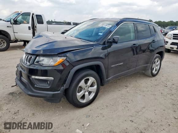 2021 Jeep Compass Latitude with VIN 3C4NJDBBXMT584022, listed as a Copart auction lot 69013615 with 74,898 mi miles and Salvage title. Bid and sale history available at DreamBid. Image 1.