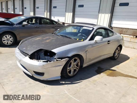 2006 Hyundai Tiburon GT с VIN KMHHN65F76U216025, выставлен на аукционе Copart как лот 74443474 с пробегом 139 626 миль миль и На запчасти • Non repairable. История ставок и продаж доступна на DreamBid. Изображение 2.