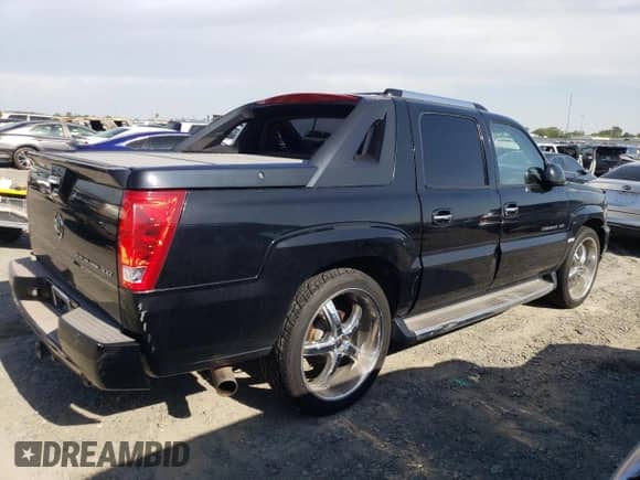 2003 Cadillac Escalade EXT with VIN 3GYEK63N03G339488, listed as a Copart auction lot 54622395 with 234,427 mi miles and Clean title. Bid and sale history available at DreamBid. Image 3.