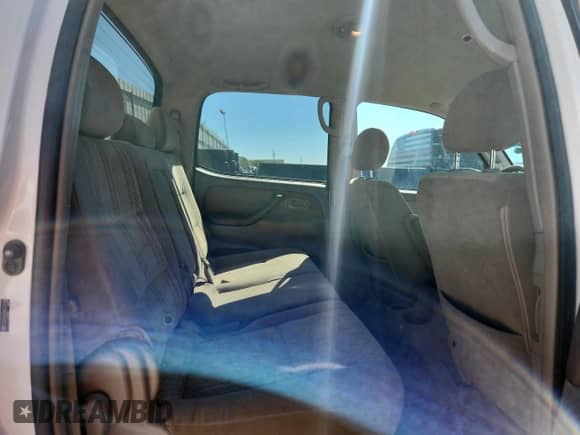 2006 Toyota Tundra SR5 с VIN 5TBDT44106S554348, выставлен на аукционе Copart как лот 81677095 с пробегом 205 293 миль миль и Списание • Salvage title. История ставок и продаж доступна на DreamBid. Изображение 10.