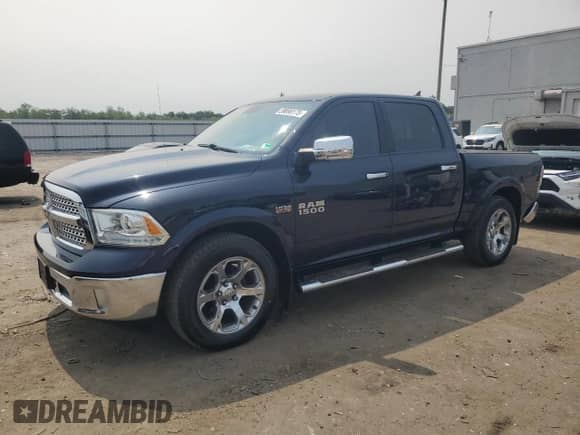 2013 Ram 1500 Laramie with VIN 1C6RR7NT6DS543668, listed as a Copart auction lot 59898175 with 144,653 mi miles and Salvage title. Bid and sale history available at DreamBid. Image 1.