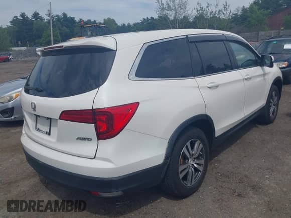 2016 Honda Pilot EX-L with VIN 5FNYF6H89GB032410, listed as a IAAI auction lot 42547598 with 117,985 mi miles and . Bid and sale history available at DreamBid. Image 4.