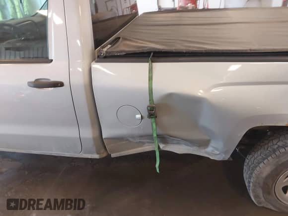 2014 Chevrolet Silverado 1500 Work Truck with VIN 1GCNKPEHXEZ233233, listed as a IAAI auction lot 42123681 with 97,797 mi miles and . Bid and sale history available at DreamBid. Image 6.