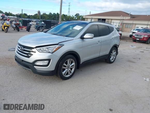 2016 Hyundai Santa Fe z VIN 5XYZWDLA1GG305495, wystawiony jako IAAI lot #43161342 z przebiegiem 121 262 mil mil oraz . Historia ofert i sprzedaży dostępna na DreamBid. Obrazek 2.