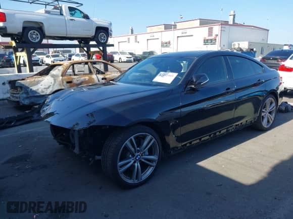 2017 BMW 4 Series 440i with VIN WBA4E3C34HG187463, listed as a IAAI auction lot 42332905 with 26,306 mi miles and . Bid and sale history available at DreamBid. Image 2.
