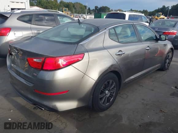 2014 Kia Optima LX with VIN 5XXGM4A72EG261688, listed as a IAAI auction lot 43439480 with 92,453 mi miles and . Bid and sale history available at DreamBid. Image 4.