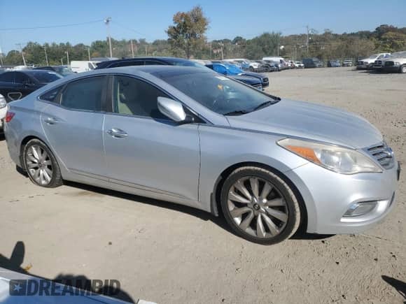 2013 Hyundai Azera с VIN KMHFH4JG4DA198549, выставлен на аукционе Copart как лот 76779744 с пробегом 213 433 миль миль и Чистый • Clean title. История ставок и продаж доступна на DreamBid. Изображение 4.