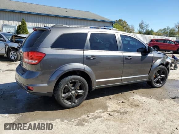 2015 Dodge Journey SXT with VIN 3C4PDDBG9FT646170, listed as a Copart auction lot 85193125 with 177,837 mi miles and Salvage title. Bid and sale history available at DreamBid. Image 3.