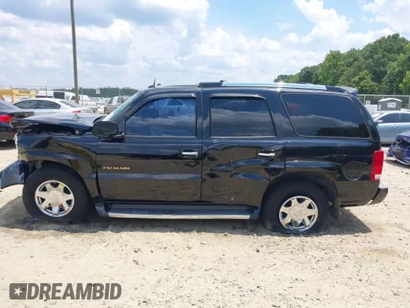 2004 Cadillac Escalade with VIN 1GYEK63NX4R198723, listed as a IAAI auction lot 42699272 with 207,301 mi miles and . Bid and sale history available at DreamBid. Image 15.