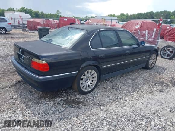 1998 BMW 7 Series 740i with VIN WBAGF8321WDL53371, listed as a IAAI auction lot 42756554 with 212,564 mi miles and . Bid and sale history available at DreamBid. Image 4.