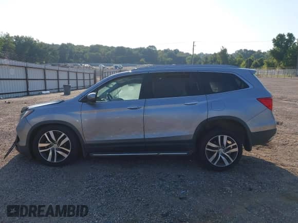 2017 Honda Pilot Elite with VIN 5FNYF6H09HB064057, listed as a IAAI auction lot 42933904 with 51,184 mi miles and . Bid and sale history available at DreamBid. Image 15.