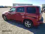 2009 Chevrolet HHR 1LT with VIN 3GNCA23B49S590428, listed as a Copart auction lot 76938344 with 142,357 mi miles and Salvage title. Bid and sale history available at DreamBid. Image 2.