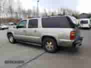 2001 Chevrolet Suburban LT with VIN 3GNFK16T11G209375, listed as a Copart auction lot 77907714 with 157,424 mi miles and Clean title. Bid and sale history available at DreamBid. Image 2.