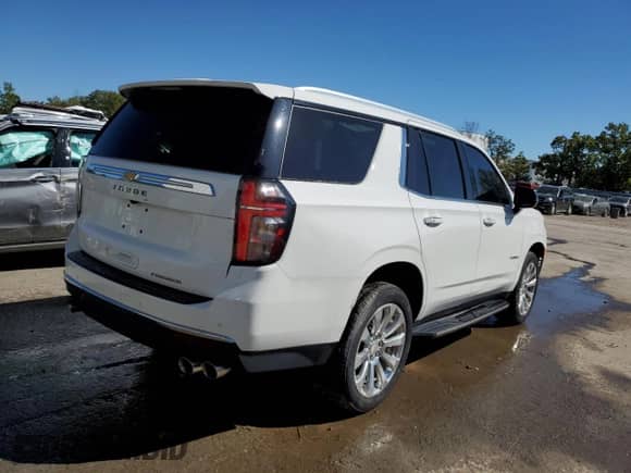 2023 Chevrolet Tahoe Premier с VIN 1GNSKSKD0PR217513, выставлен на аукционе Copart как лот 82042365 с пробегом 55 424 миль миль и Списание • Salvage title. История ставок и продаж доступна на DreamBid. Изображение 3.