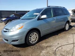 2009 Toyota Sienna XLE with VIN 5TDBK22C49S024026, listed as a Copart auction lot 80261595 with 144,187 mi miles and Clean title. Bid and sale history available at DreamBid. Image 1.