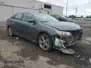 2012 Toyota Camry XLE with VIN 4T1BK1FK7CU005321, listed as a Copart auction lot 86333835 with 318,899 mi miles and Salvage title. Bid and sale history available at DreamBid. Image 4.