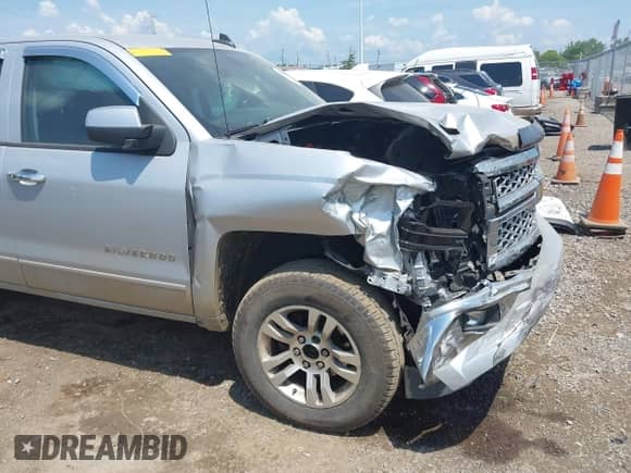 2015 Chevrolet Silverado 1500 LT z VIN 1GCVKREHXFZ431825, wystawiony jako IAAI lot #42714255 z przebiegiem 172 750 mil mil oraz . Historia ofert i sprzedaży dostępna na DreamBid. Obrazek 6.