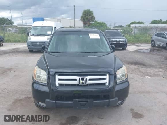 2006 Honda Pilot EX-L with VIN 5FNYF18786B016899, listed as a IAAI auction lot 43182632 with 418,378 mi miles and . Bid and sale history available at DreamBid. Image 6.