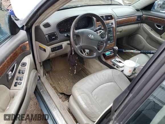 2005 Hyundai XG с VIN KMHFU45E45A382735, выставлен на аукционе Copart как лот 56143445 с пробегом 127 188 миль миль и Списание • Salvage title. История ставок и продаж доступна на DreamBid. Изображение 8.